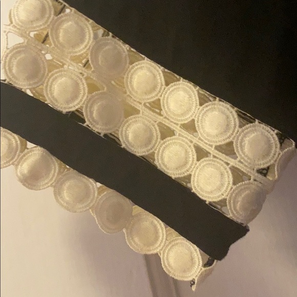 Black top with white detailed sleeves and bottom - Picture 3 of 3